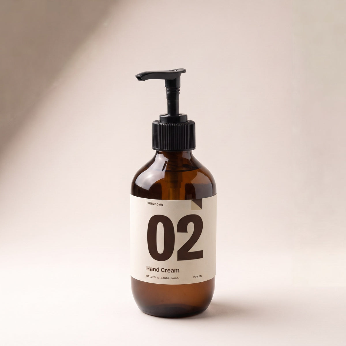 TURNDOWN No. 02 Hand Cream, 270 ml amber pump bottle, front